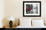 Framed Print, Retro Vintage Red Bike On Cobblestone Street In The Old Town Color In Black And