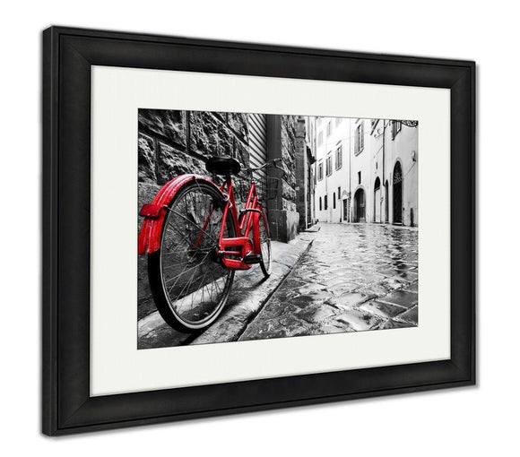 Framed Print, Retro Vintage Red Bike On Cobblestone Street In The Old Town Color In Black And